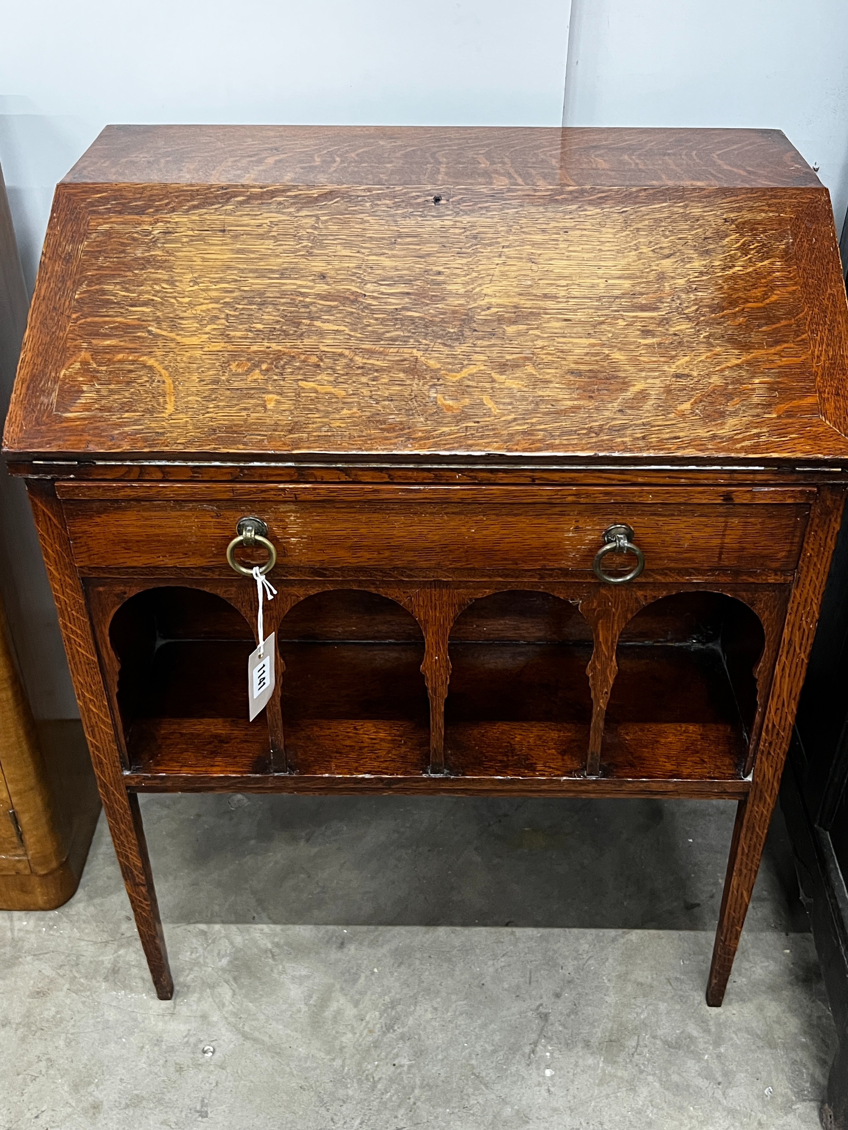 A small arts and crafts oak bureau width 62cm, depth 40cm, height 80cm